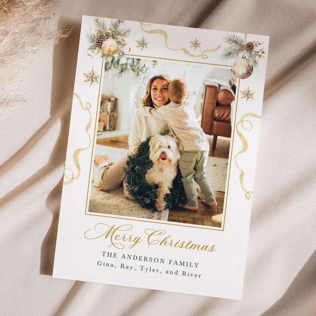 Christmas card with a photo of a family and dog, featuring decorative elements.